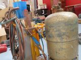 a propanene and a propanene tank on a table