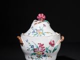 an image of a white and pink vase with flowers on it