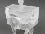 an image of a clear glass box with a bird on it