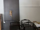 many chairs and a table in a room