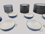 a lot of plates and bowls that are stacked together