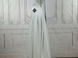 the back of a white dress on a mannequin mannequin mannequin mannequin mannequin mannequin mannequin mannequin