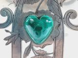 a green heart on the back of a silver chair
