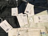 a lot of clothes that are on a table
