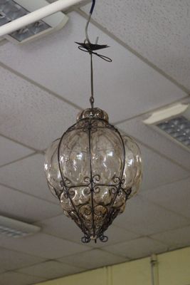 a light that is hanging from the ceiling in the room