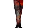 un vase en verre sur lequel est représentée une girafe
