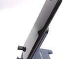 a cell phone that is sitting on top of a stand