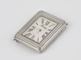 an image of a silver clock with roman numerals on the face
