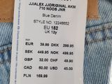 the back of a pair of jeans with a price tag on it