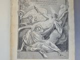 un vieux livre avec le dessin d'un homme sur un cheval