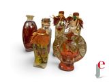 three vases that have been decorated with flowers and leaves