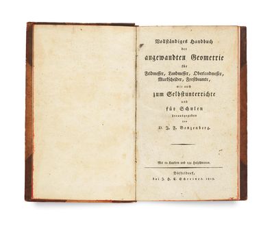 an old book with a black and white title on it