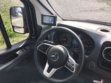 a view of the dashboard of a vehicle from the driver ' s seat