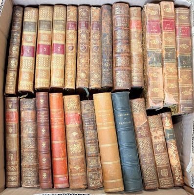 a box full of old books sitting on a table