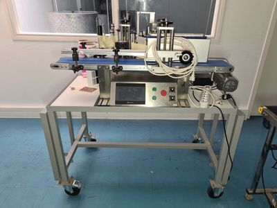 L1 : Etiqueteuse automatique sur table WEINVIEN