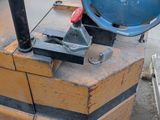 an image of a forklift with a blue drum on it