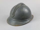 a helmet that is sitting on a white surface