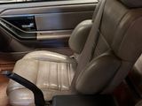 a picture of the inside of a car with leather seats