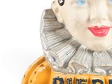a close up of a statue of a woman ' s face