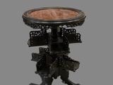 an image of a table with a wooden top on a grey background