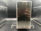 a mirror with a chain hanging from it on a stand