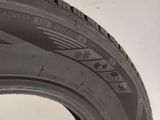 the tire of a car is shown on a white surface