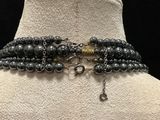 a close up of a necklace on a mannequin mannequin mannequin mannequin mannequin mannequin mannequin mannequin
