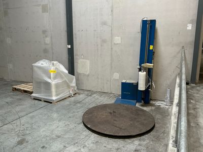 a large metal object sitting on the floor in a room
