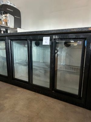 an image of a refrigerator with glass doors in a store