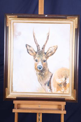 une photo d'un tableau représentant un cerf posé sur un chevalet