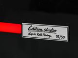 a close up of a label on a black car