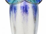 a blue and white vase with a blue and white design on it