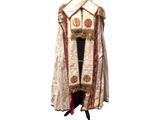 an image of a white robe with a red and gold trim