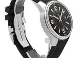 an image of a wrist watch with a black dial and black rubber band