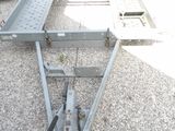 an image of a trailer that is parked in a parking lot