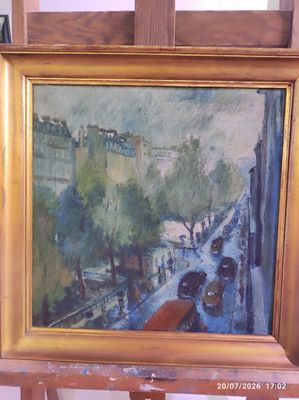 une image d'un tableau sur un chevalet dans une pièce