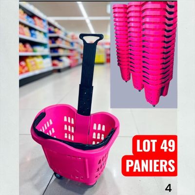 a picture of a pink shopping basket with a black handle