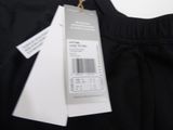 the back of a pair of black pants with a price tag on it