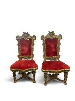 pair of antique chairs with red velvet upholstered seats