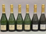six bouteilles de champagne sont alignées