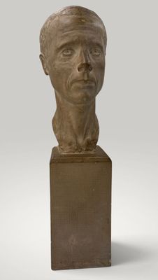 bust of a man on a pedestal with a gray background