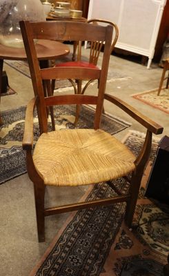 a chair that is sitting in the middle of a room