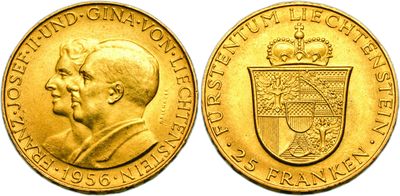 a close up of a gold coin with a crown on it
