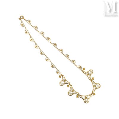 une image représentant un collier en or serti de diamants sur fond blanc