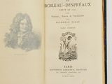 an open book with a drawing of a man and a woman on it