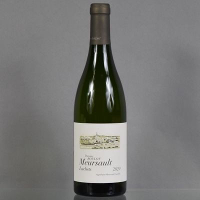 a bottle of wine that is sitting on a table
