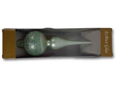 a green glass vase in a box on a white background