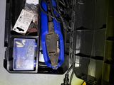 a tool box that has a bunch of tools inside of it