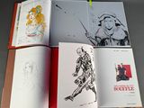 an open book with a drawing of a woman and a man on it
