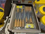 a lot of tools in a box on the table